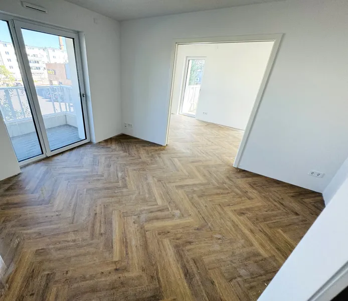 Modernes 2-Zimmer Apartment mit EBK, Gaderobe und 2 Balkonen! — photo 1